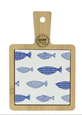 Two wooden cutting boards with fish patterns on a white background