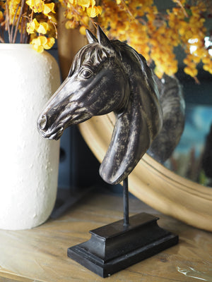 Rustic horse head on stand