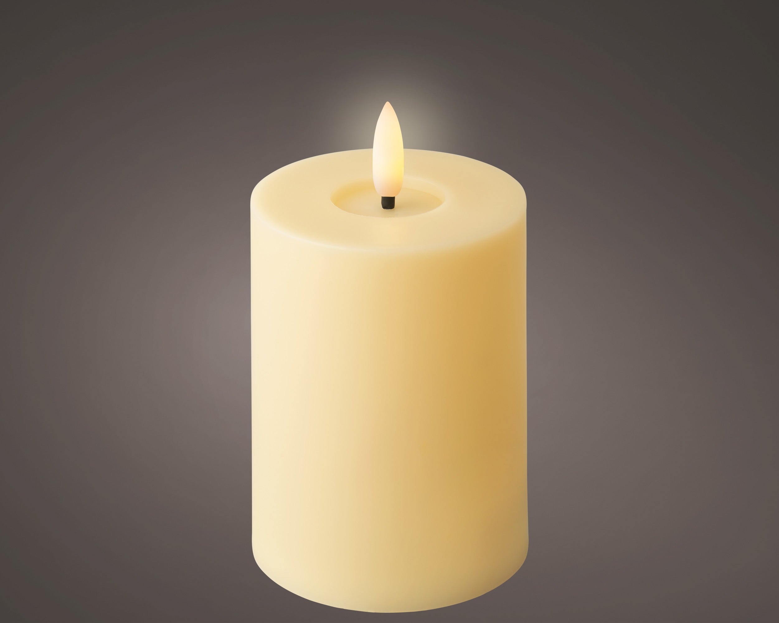 Yellow battery operated pillar candle (12.5cmH)