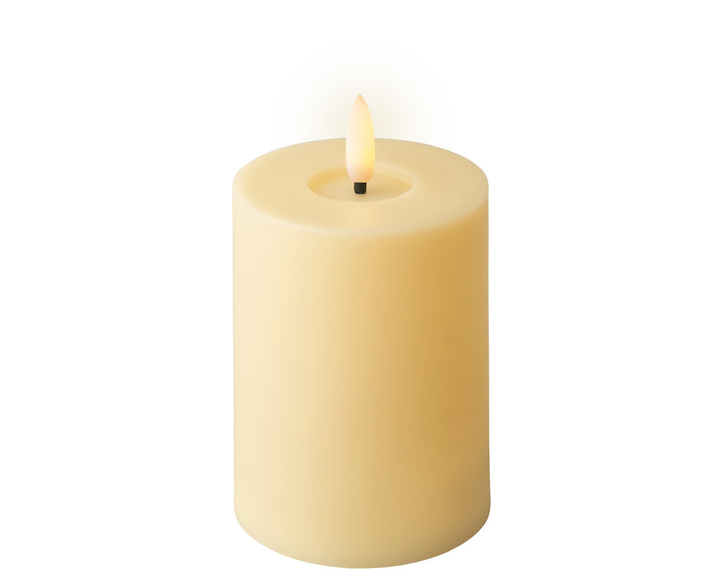 Yellow battery operated pillar candle (12.5cmH)