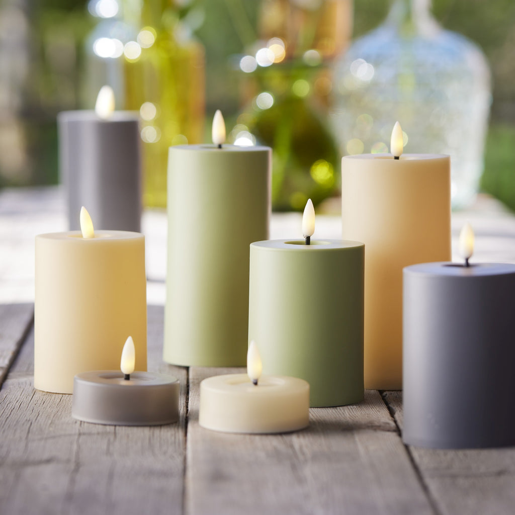 Yellow battery operated pillar candle (17cmH)