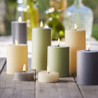 Yellow battery operated pillar candle (17cmH)