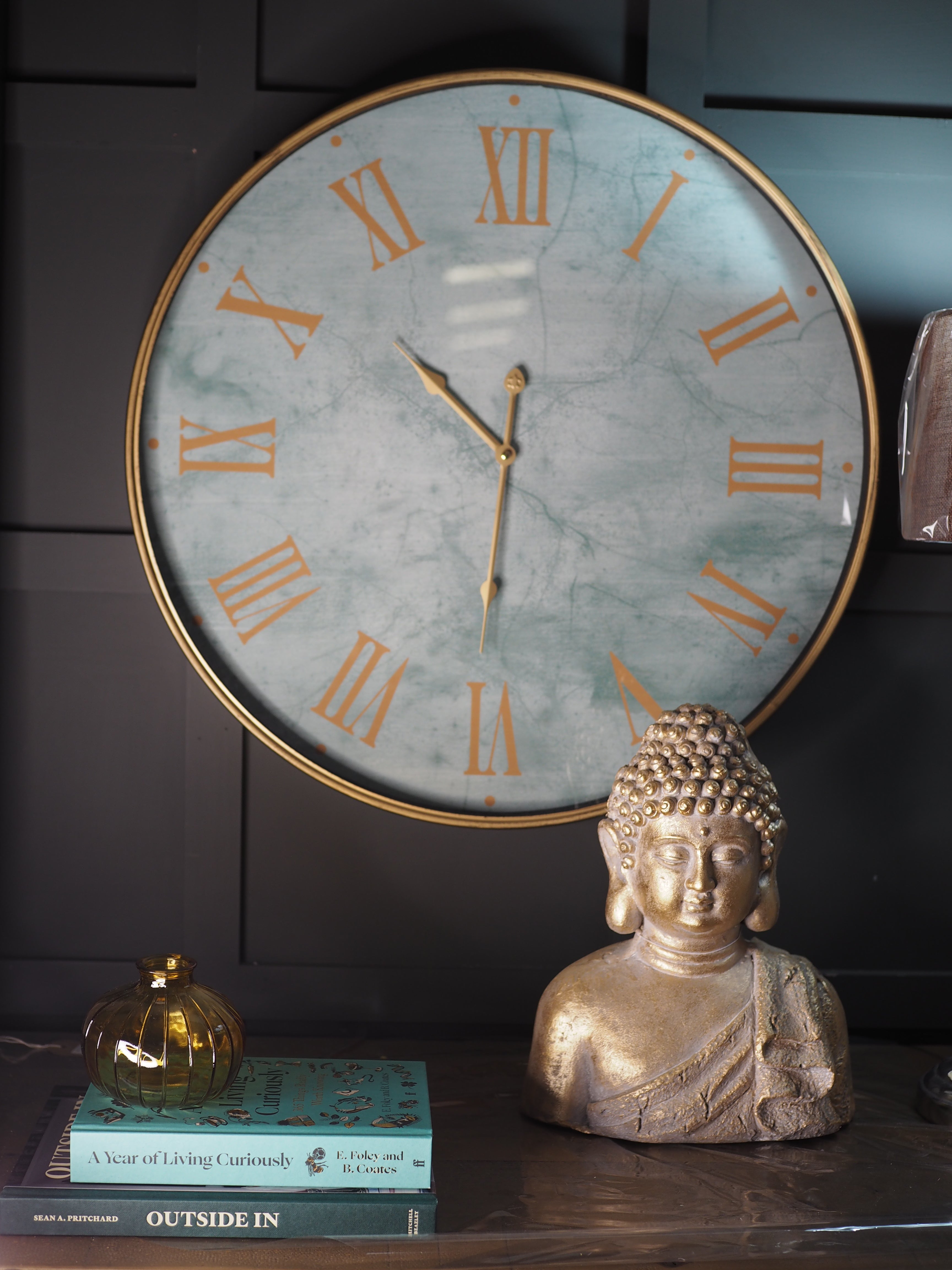 Turquoise marble face clock with gold Roman numerals