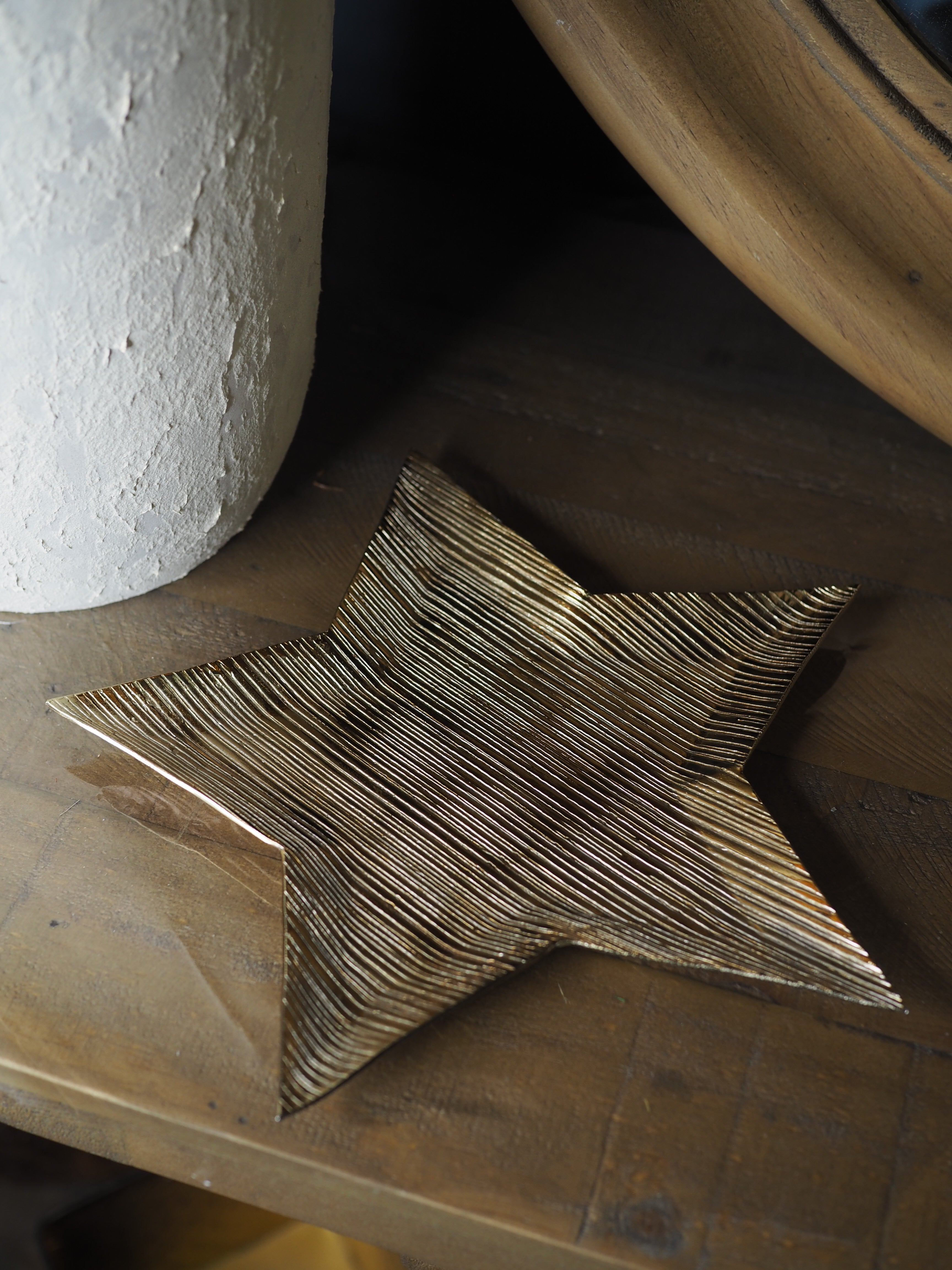 Gold metal star shaped plate