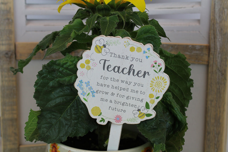 Teacher plant stick with floral detail and quote