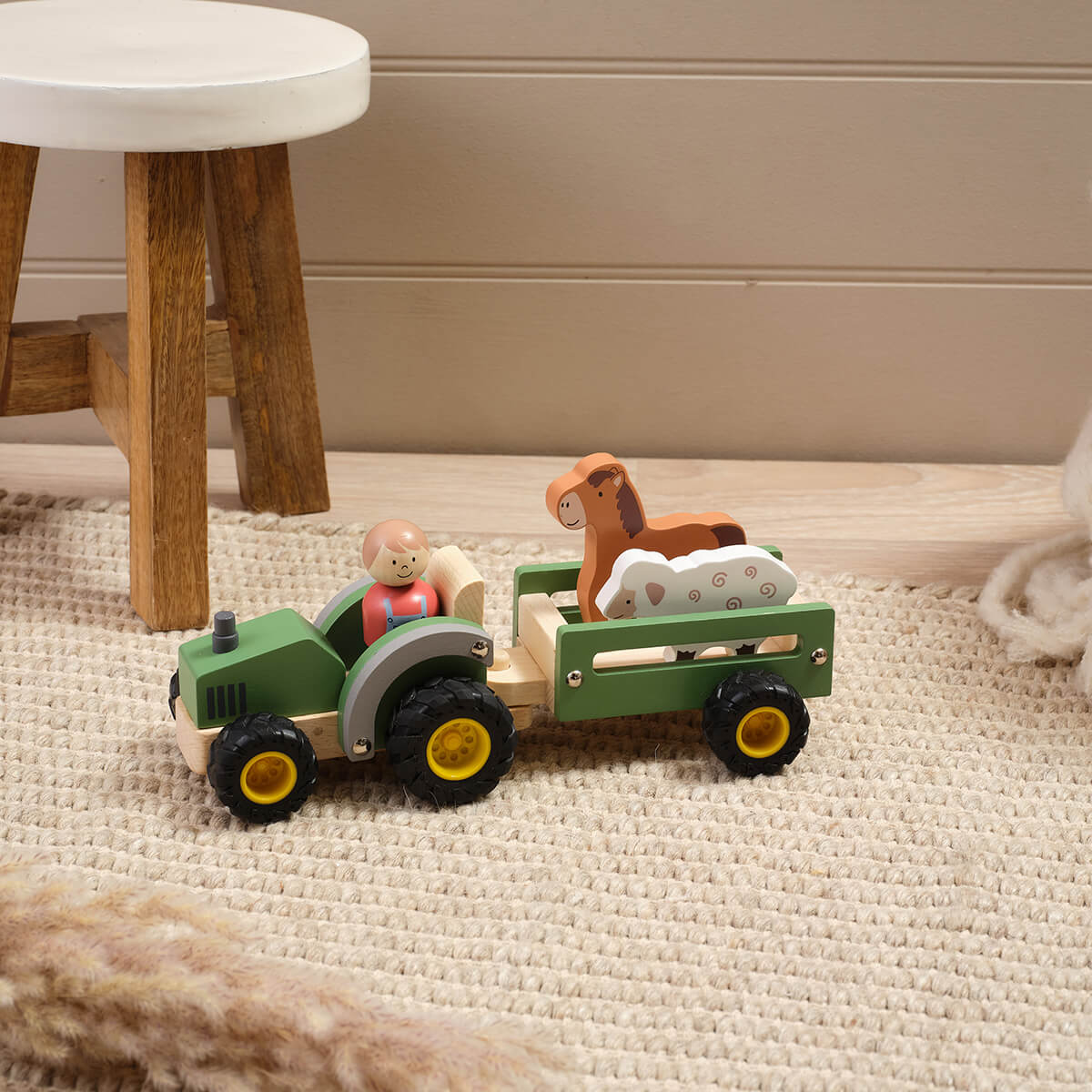 Wooden tractor with farm animals