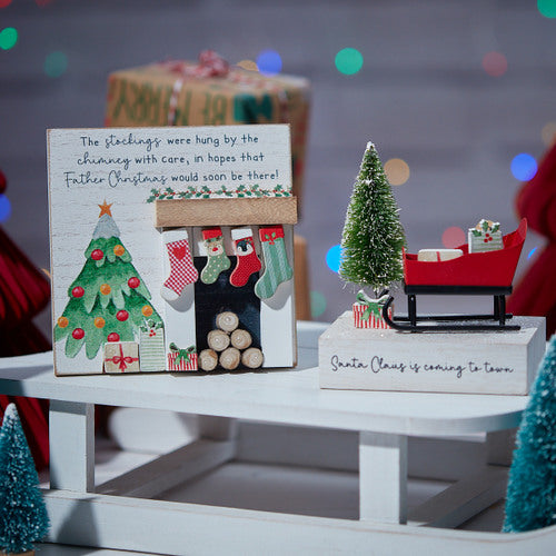 Stockings hung by the fire wooden block