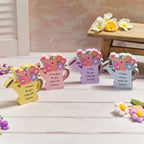Wooden watering can with flowers