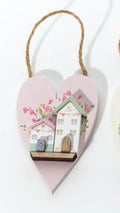 Cottage garden wooden heart with house
