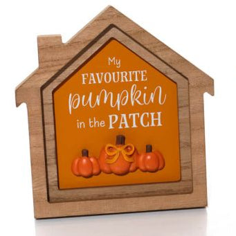 Wooden framed house-shaped plaque