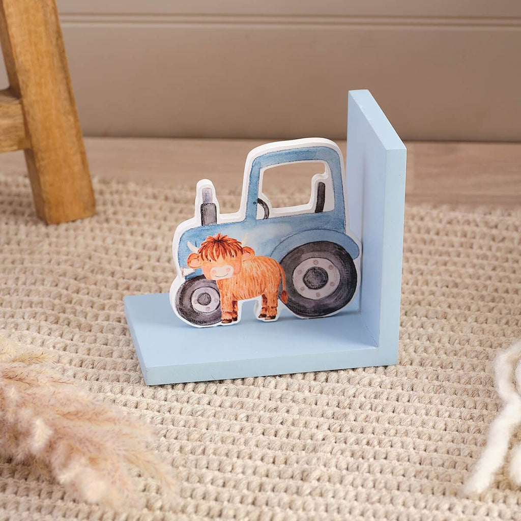 Monty highland cow tractor bookend