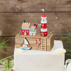 Nautical wooden harbour with lighthouse and boat