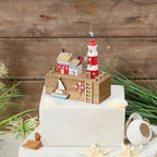 Nautical wooden harbour with lighthouse and boat