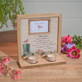 Robins appear when loved ones are near wooden photo frame with tealight holder