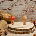 Wooden toadstool house hanging decs