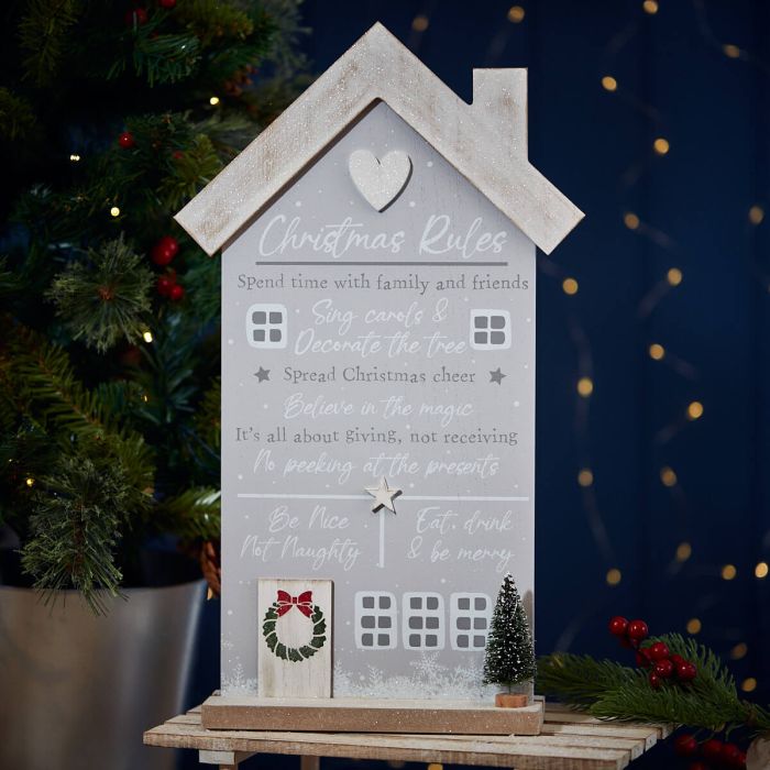 Christmas rules house plaque with snowy tree