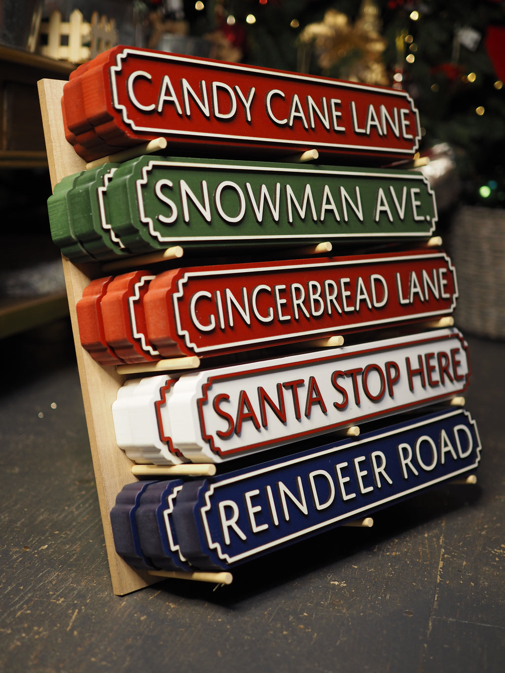 Christmas wood road signs