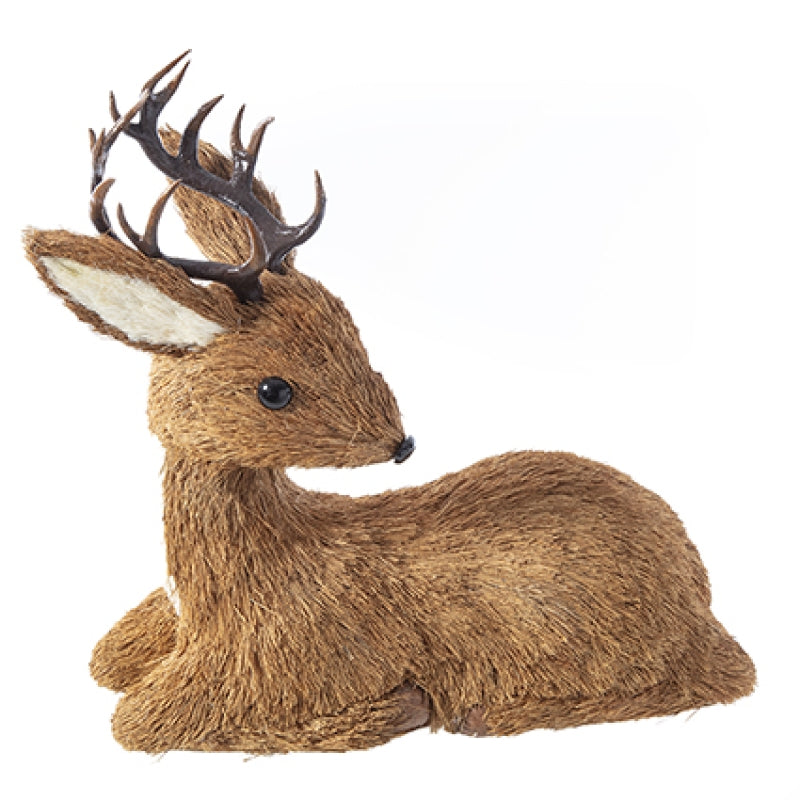 Sitting rustic stag with small antlers