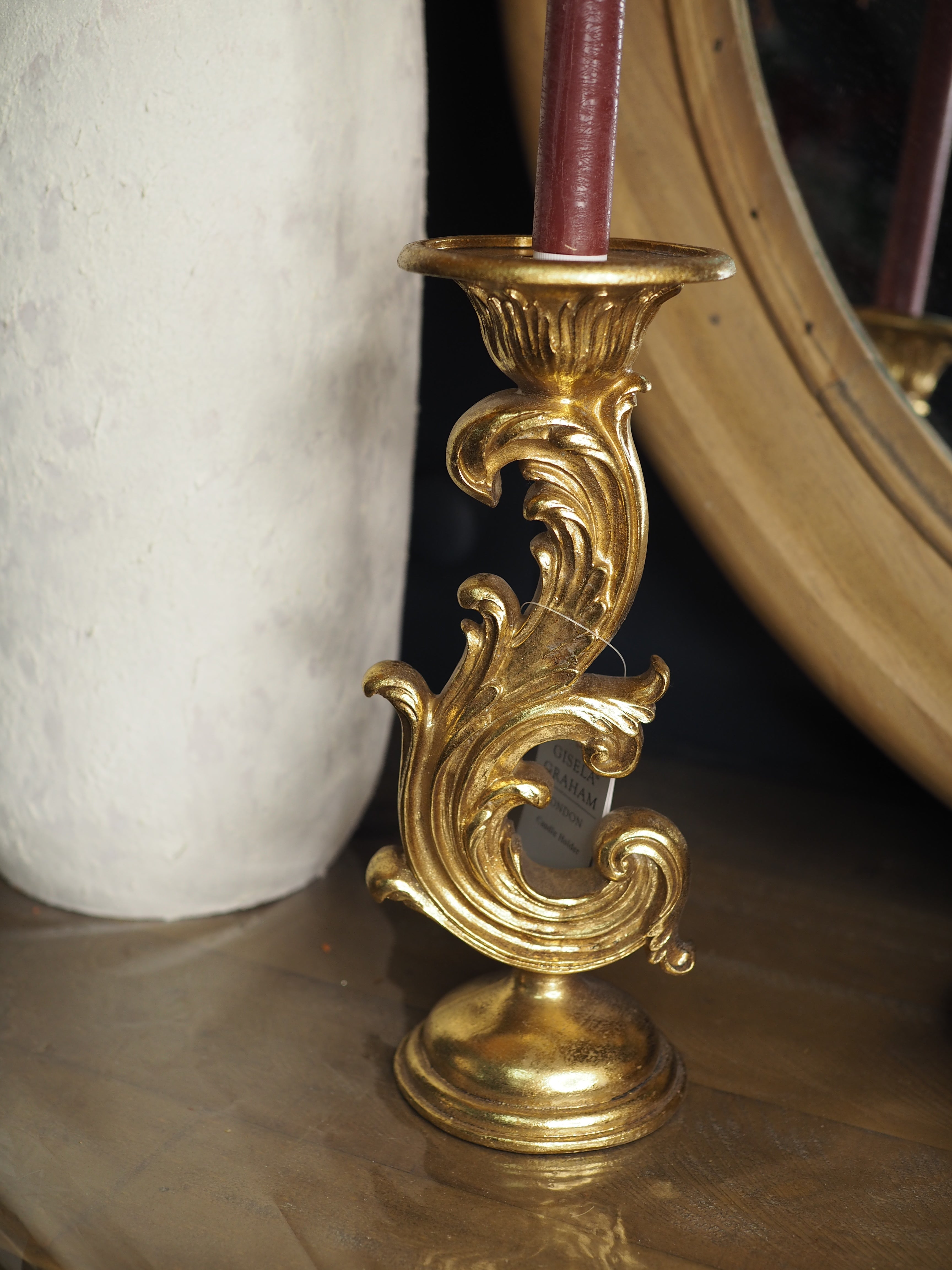 Gold scroll candlestick