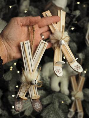 Wooden skis with snowflake