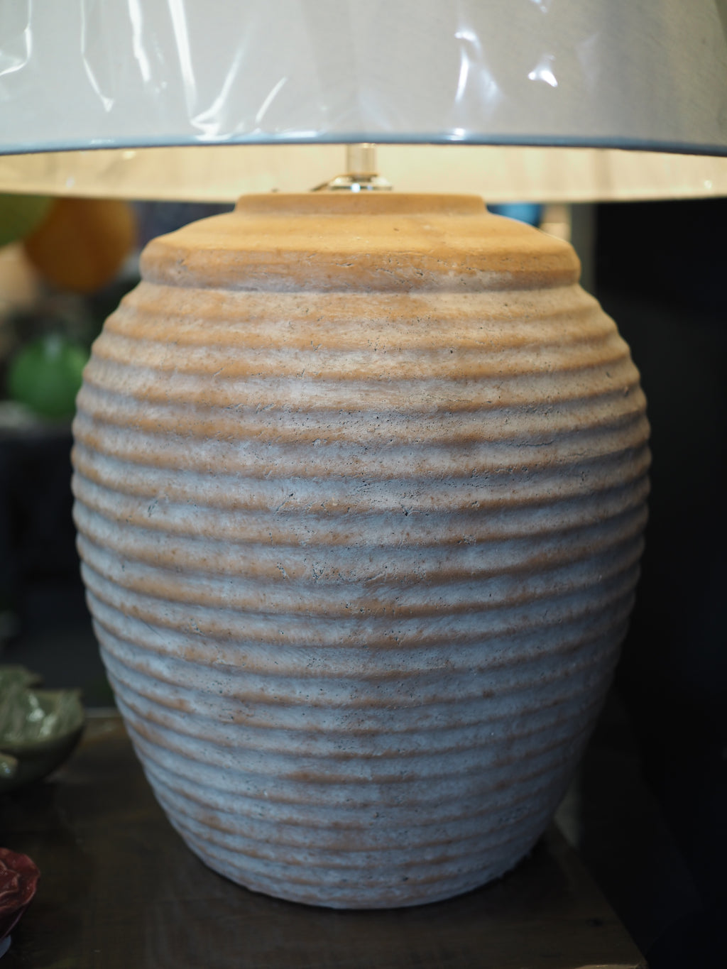 Terracotta ribbed table lamp with ivory shade