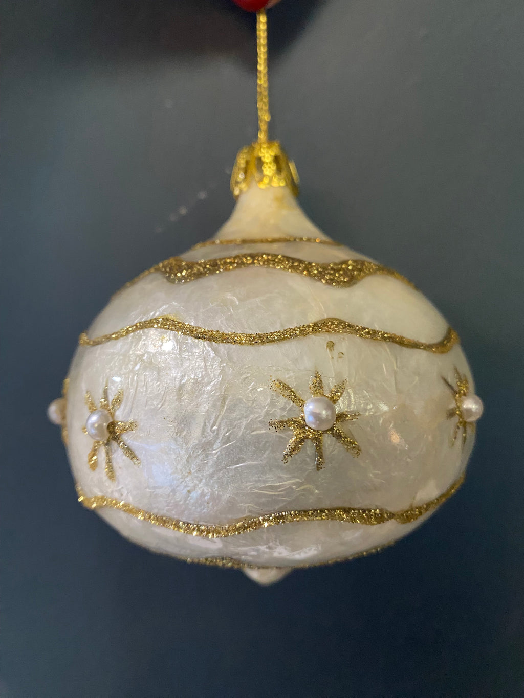 Cream and gold bauble with pearl details