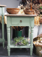 Green side table with shelf display