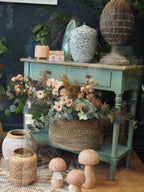 Two drawer green console table with shelf