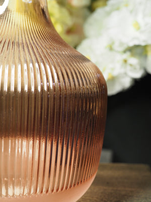 Pink ribbed glass vase