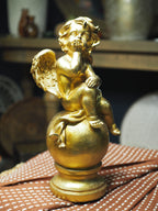 Antique style gold cherub ornament