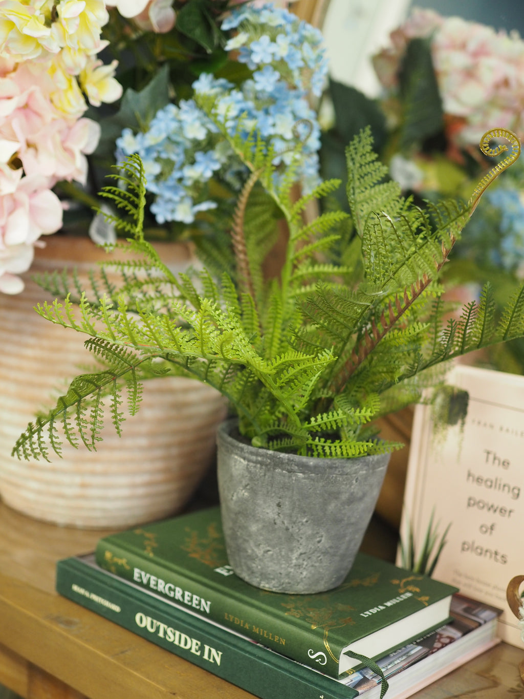 Faux fern with tendrils in pot