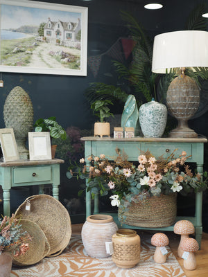 Two drawer green console table with shelf