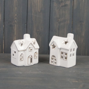 Cream ceramic LED tealight house with cut out stars