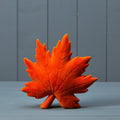 Flocked ceramic maple leaf ornament in burnt orange