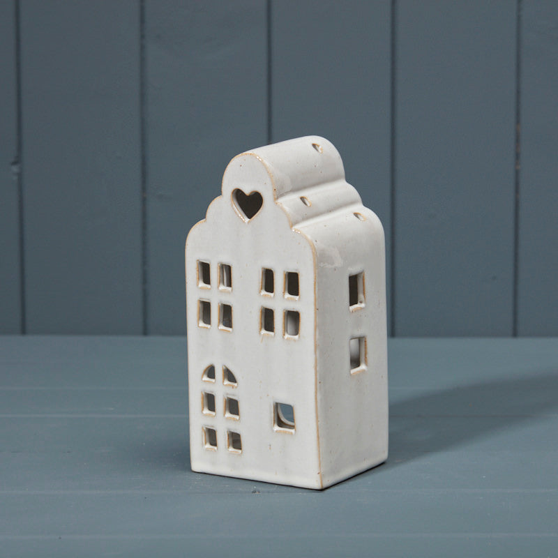 Quirky off white ceramic tealight house with heart