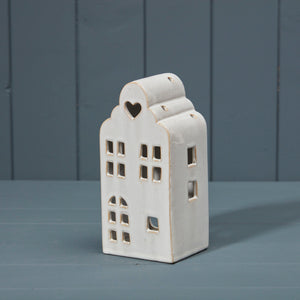 Quirky off white ceramic tealight house with heart