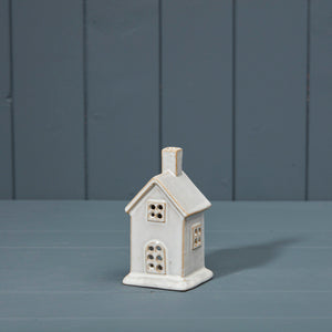 Small off white ceramic tealight house with tall chimney