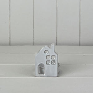 Quirky off white ceramic house tealight holder