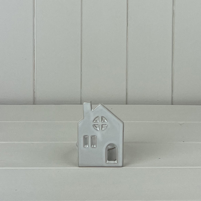 Quirky off white ceramic house tealight holder