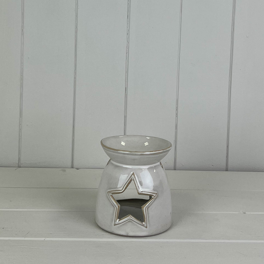 Ceramic wax/oil burner with star cut out