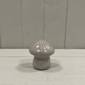 Large glazed ceramic mushroom ornament with textured detail