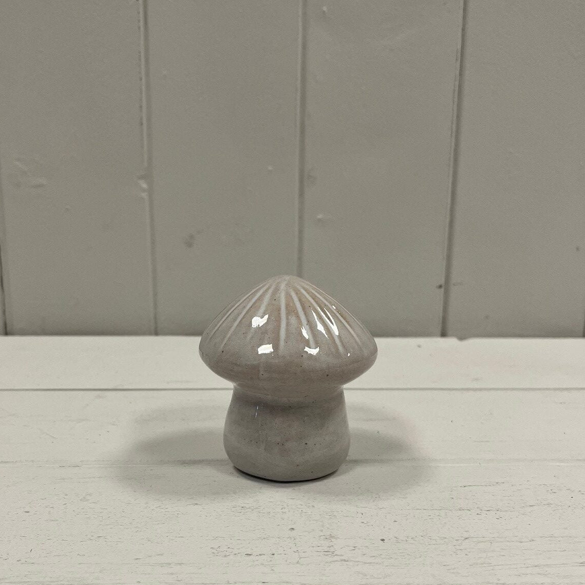Large glazed ceramic mushroom ornament with textured detail