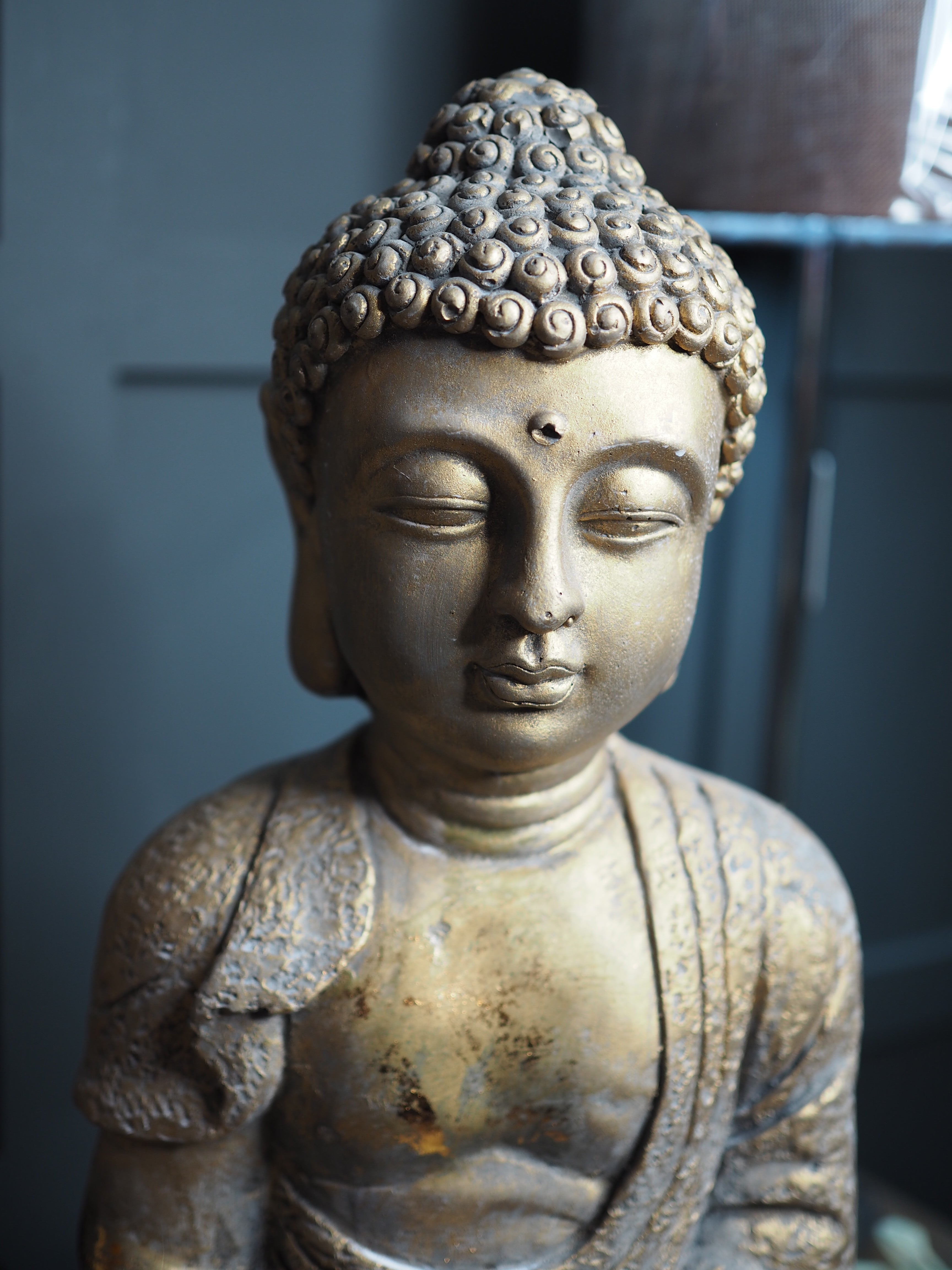 Gold sitting buddha ornament