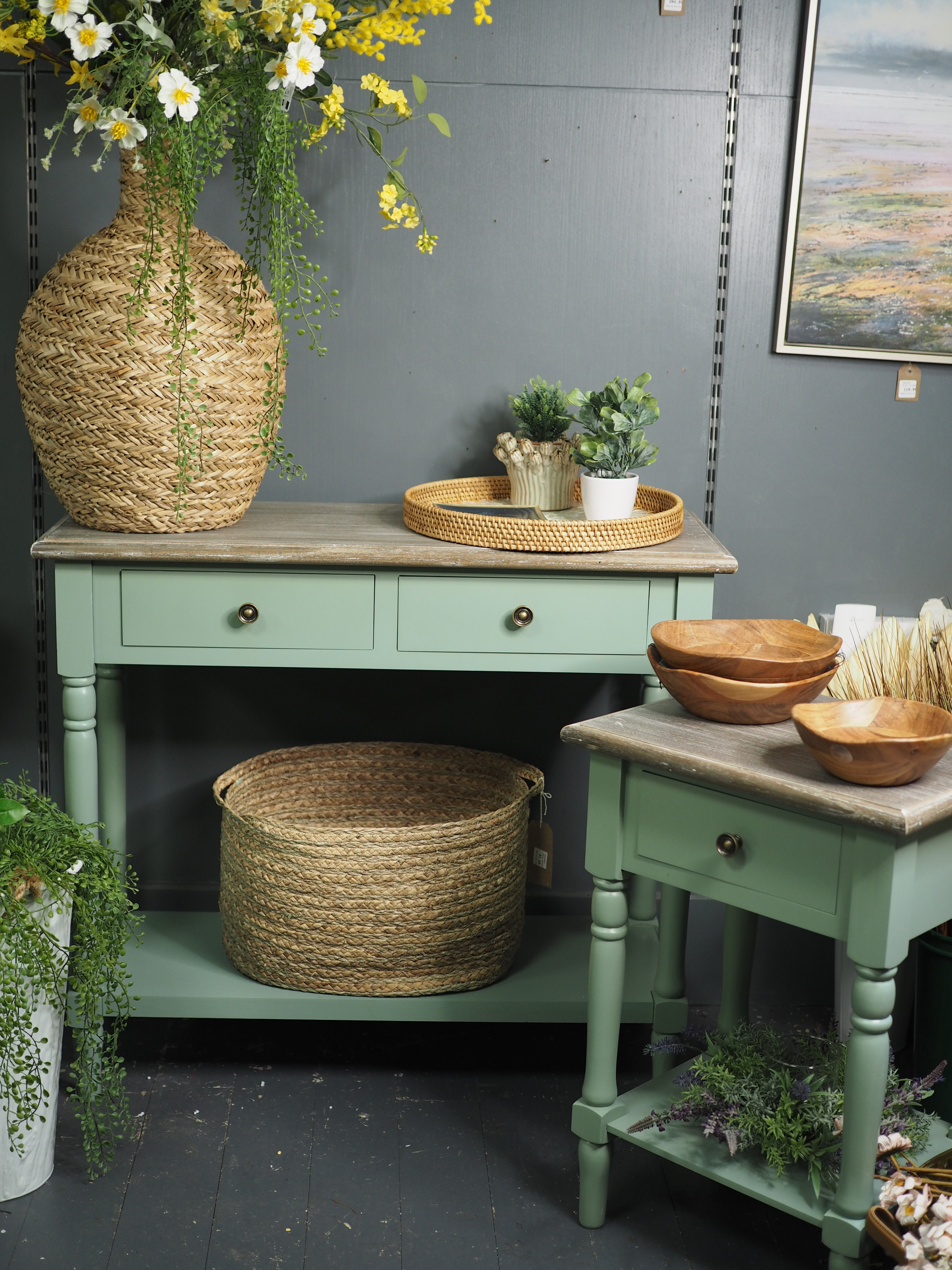 Two drawer green console table with shelf