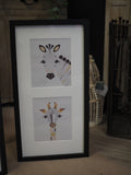 Zebra & giraffe framed print