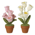 Knitted flowers in pot