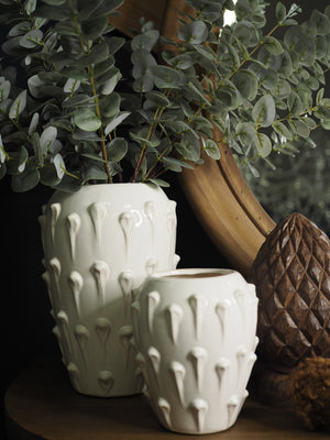 Small cream ceramic bobble vase