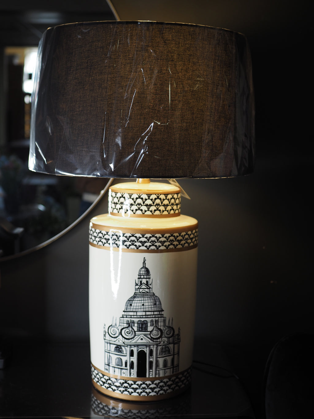 Black and white ceramic table lamp with black shade