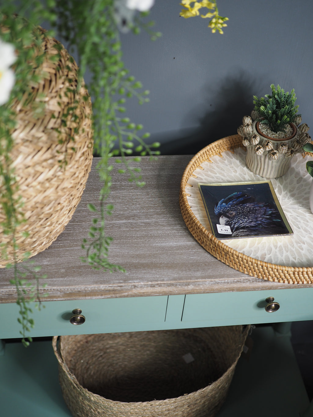 Two drawer green console table with shelf