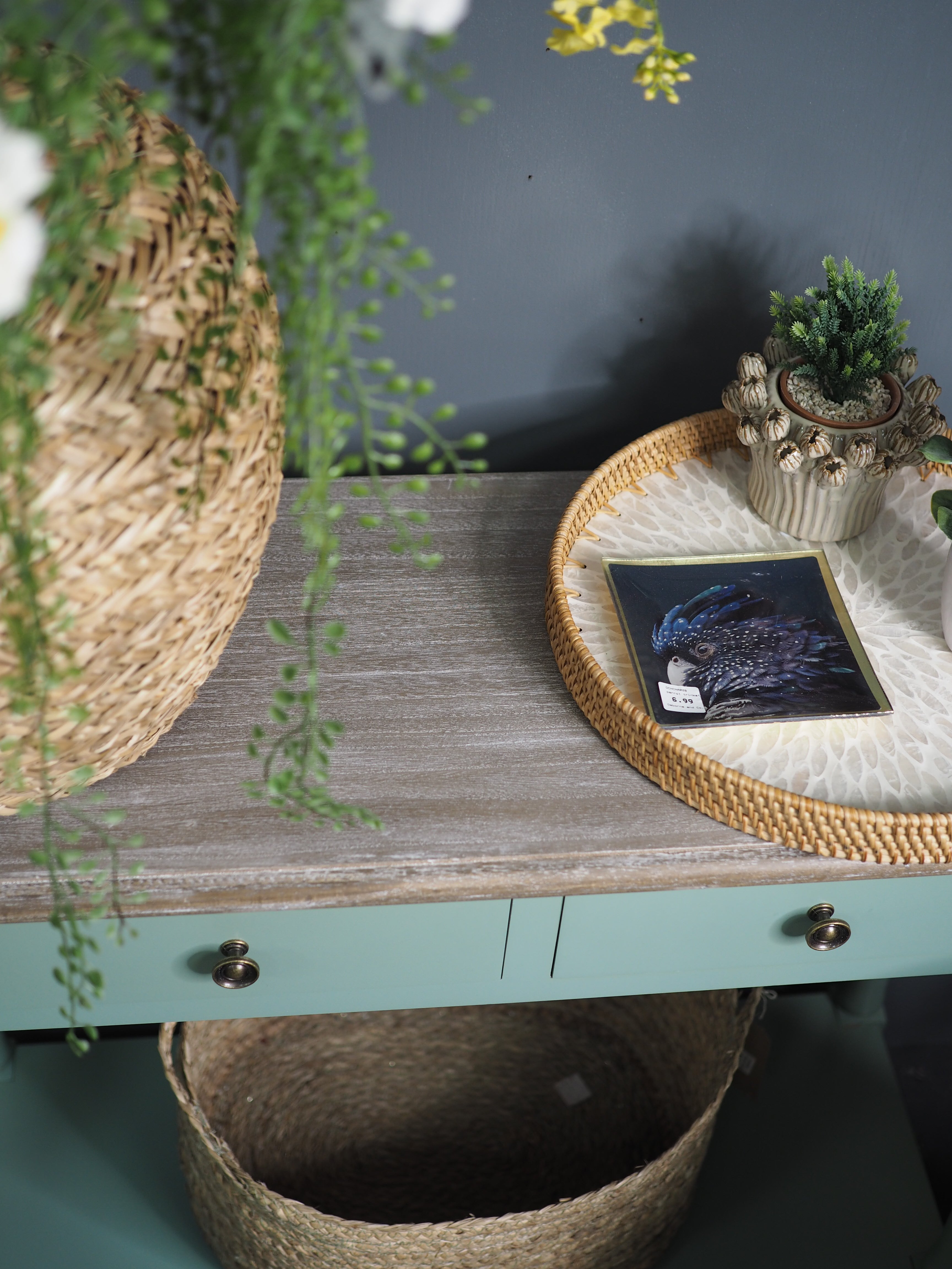 Two drawer green console table with shelf